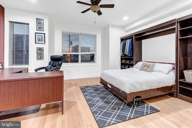 bedroom with wood-type flooring