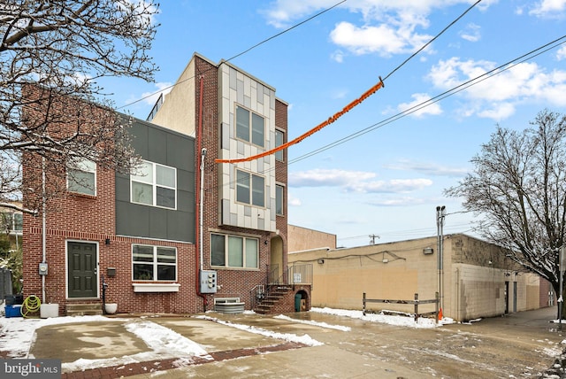 view of front of home featuring central AC