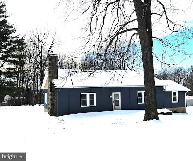 view of snow covered property