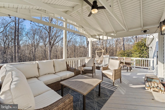 deck featuring outdoor lounge area