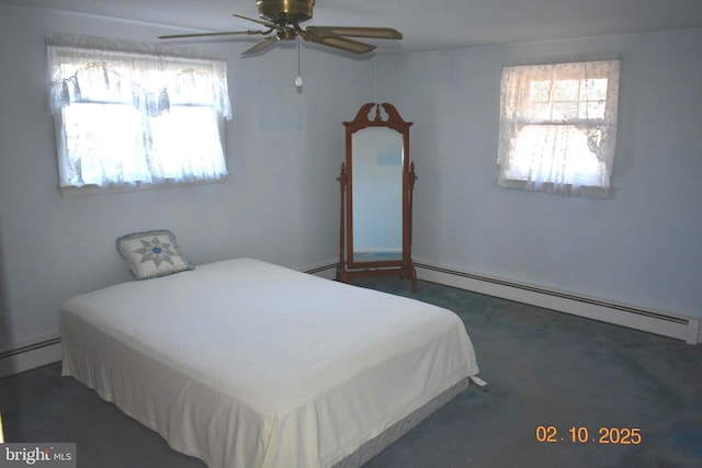 carpeted bedroom featuring a baseboard radiator and ceiling fan