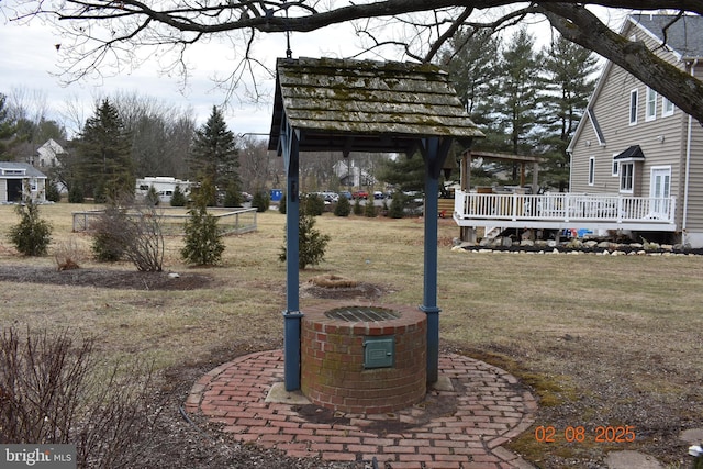 view of yard with a wooden deck