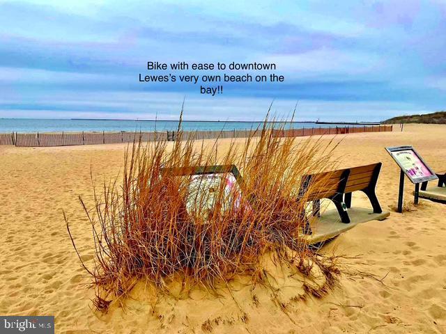 view of water feature with a beach view