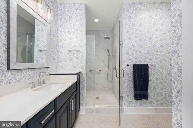 bathroom with vanity and walk in shower