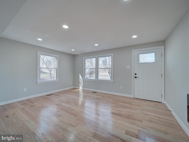 entrance foyer featuring light hardwood / wood-style floors