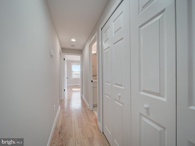 hallway featuring light wood-type flooring