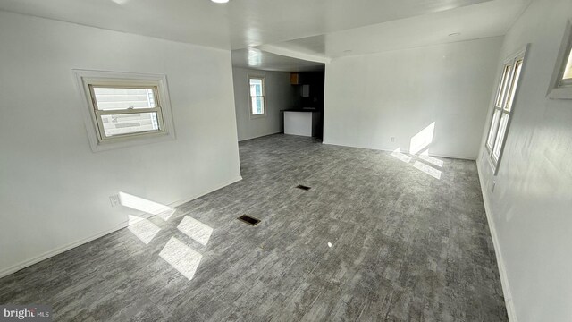 unfurnished room featuring hardwood / wood-style floors