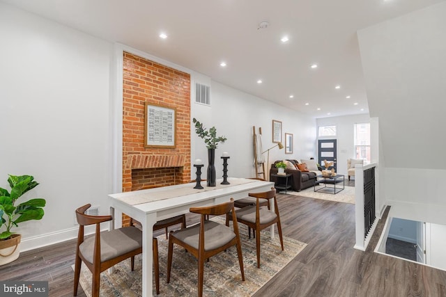 dining area with dark wood-type flooring