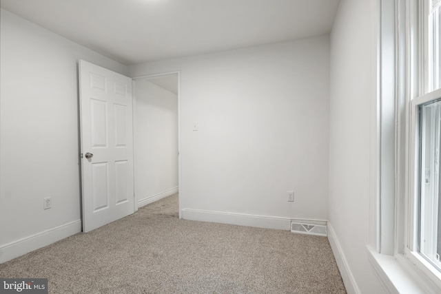 spare room with carpet flooring