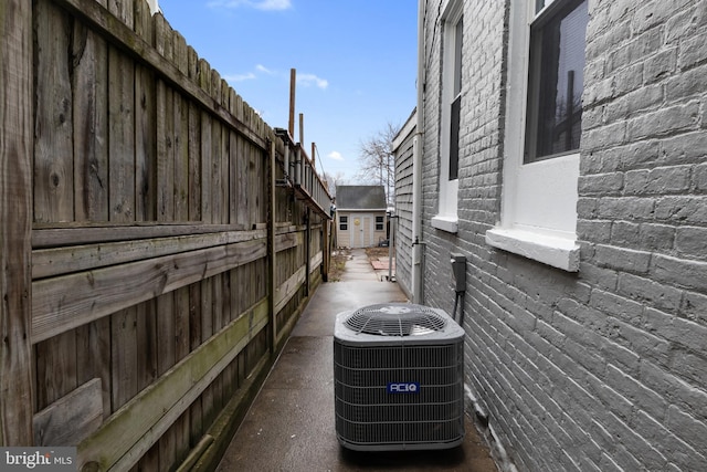 view of property exterior with central AC unit