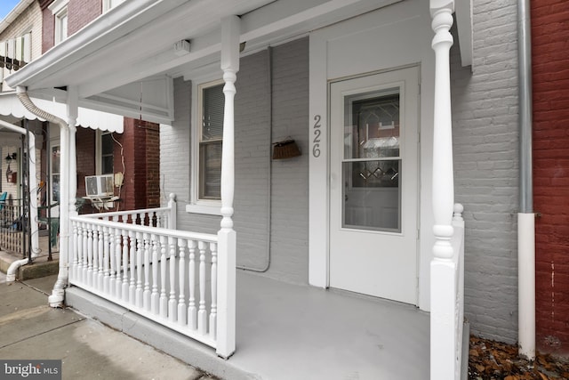 view of exterior entry featuring cooling unit