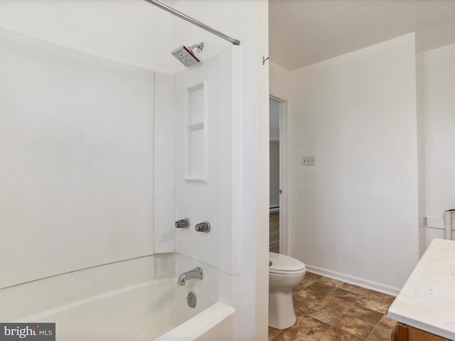 full bathroom featuring toilet, bathing tub / shower combination, and vanity