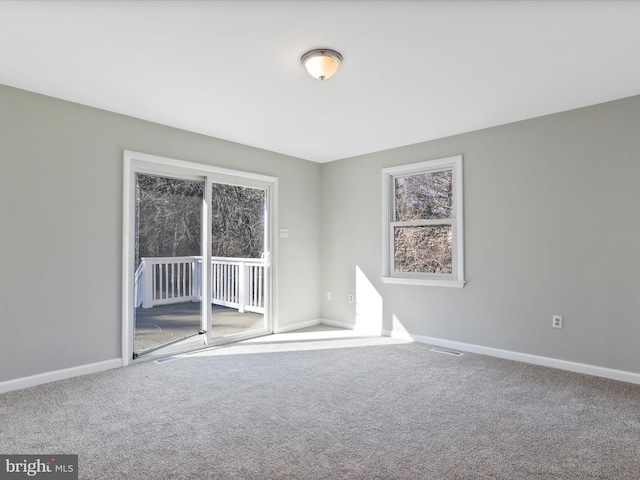 view of carpeted spare room