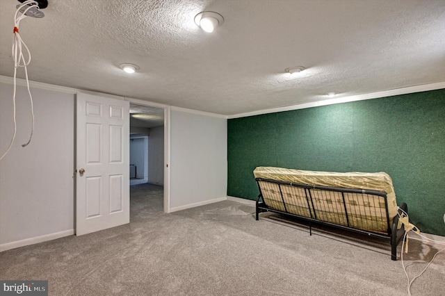 unfurnished bedroom with crown molding, carpet floors, and a textured ceiling