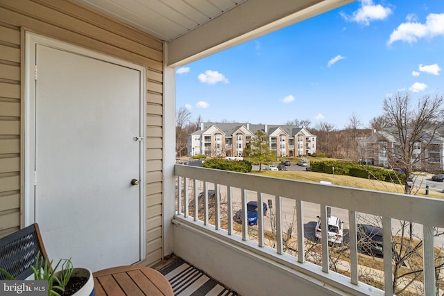 balcony featuring a residential view