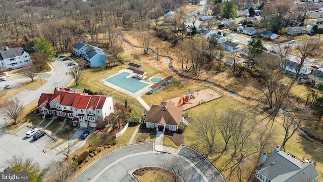 birds eye view of property with a residential view