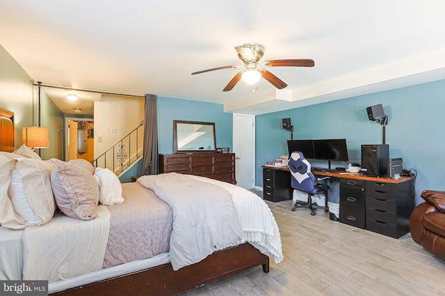 bedroom featuring hardwood / wood-style flooring and ceiling fan