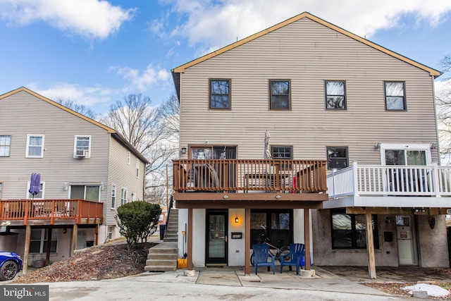 back of property with a deck