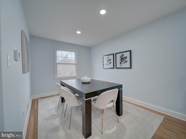 dining room with light wood-type flooring