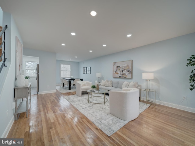 living room with light hardwood / wood-style floors