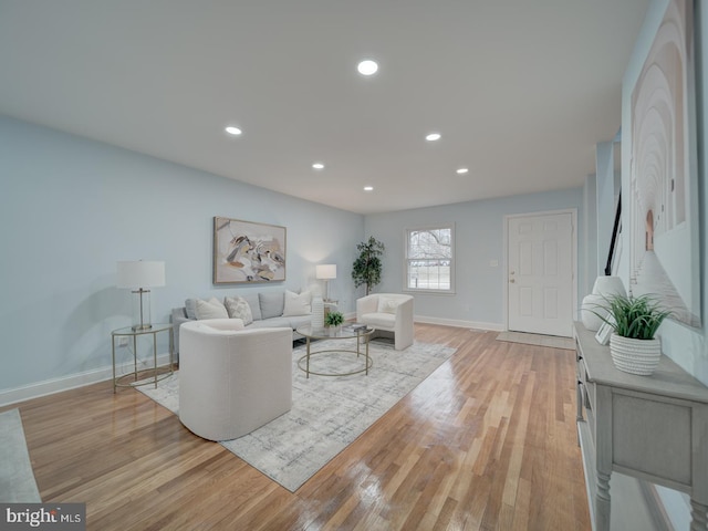 living room with light hardwood / wood-style floors