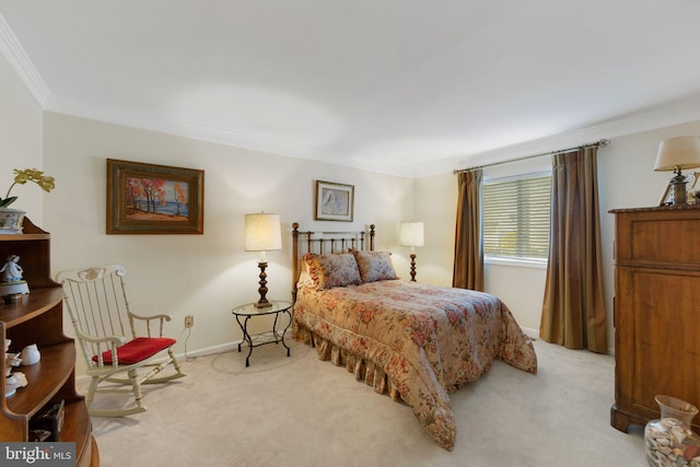 bedroom with ornamental molding and light carpet