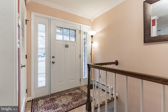 entryway featuring ornamental molding, plenty of natural light, and baseboard heating