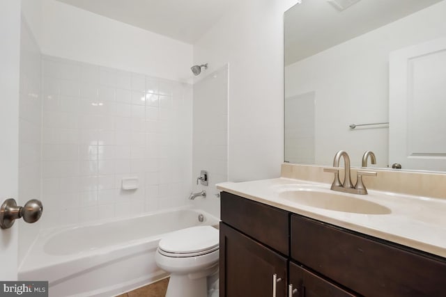 full bathroom with  shower combination, vanity, and toilet