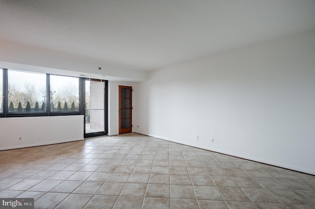 view of tiled empty room