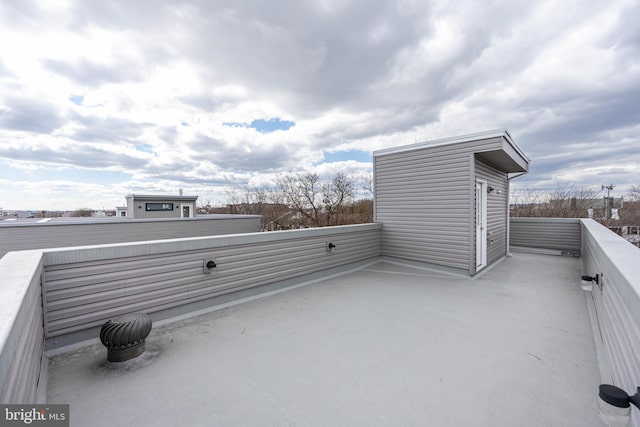 view of patio / terrace with a balcony