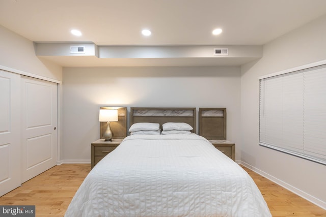 bedroom with wood-type flooring