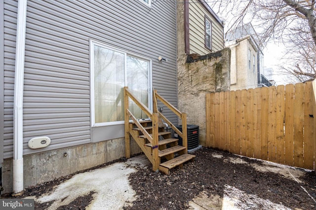 view of property exterior with central AC unit