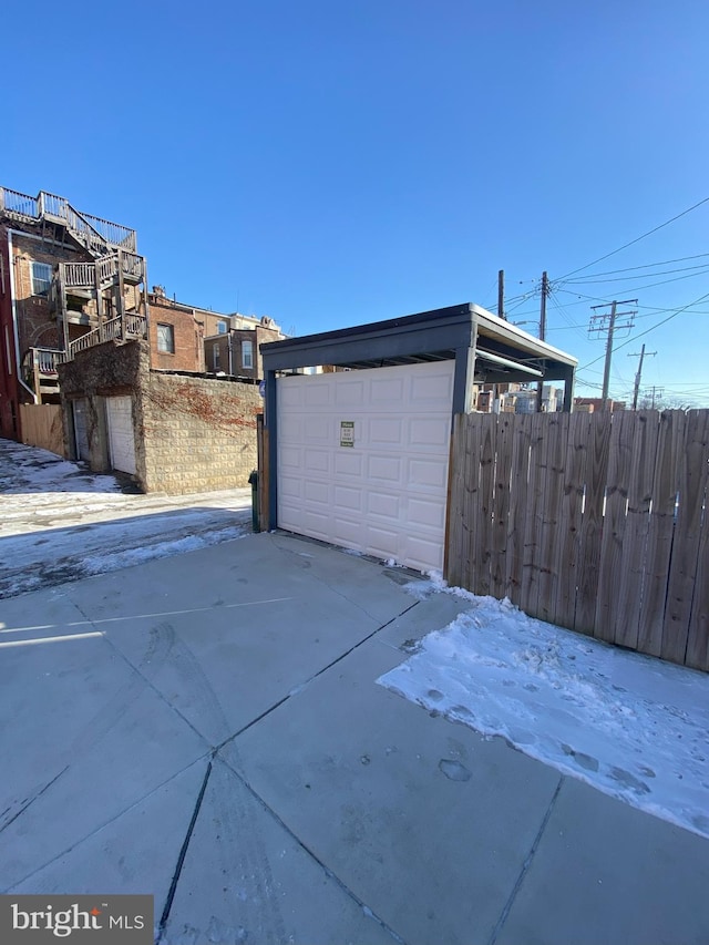 view of snow covered garage