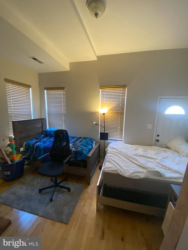 bedroom with light hardwood / wood-style flooring