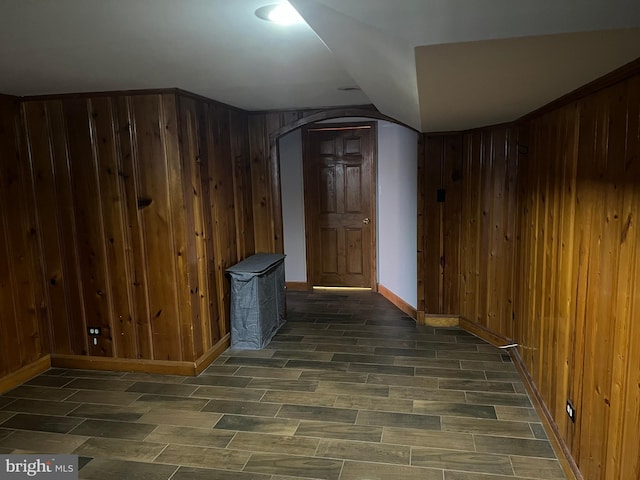 bonus room with wooden walls