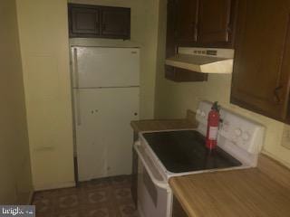 kitchen with dark brown cabinetry and white range with electric stovetop