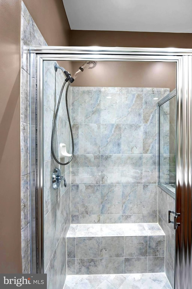 bathroom with an enclosed shower