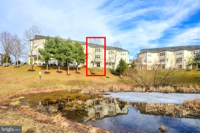 exterior space featuring a water view