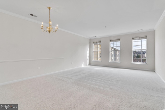 carpeted spare room featuring a chandelier, visible vents, baseboards, and ornamental molding