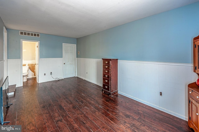 living room featuring dark wood-type flooring