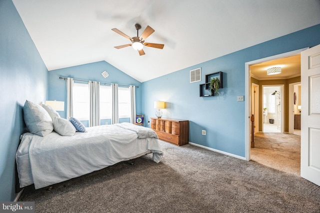 carpeted bedroom with vaulted ceiling, ornamental molding, and ceiling fan