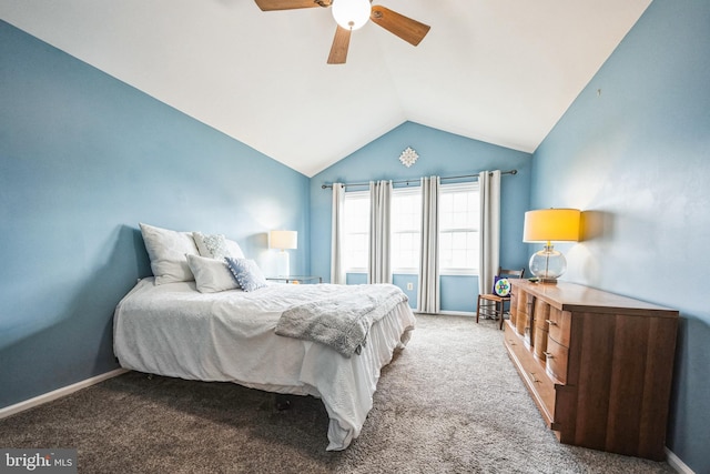 bedroom with vaulted ceiling, carpet flooring, and ceiling fan