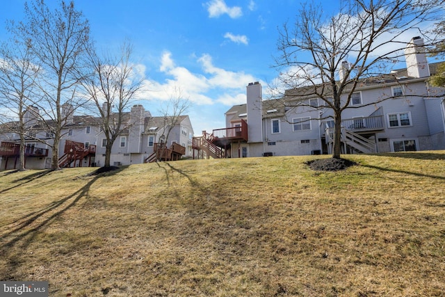 view of yard with a deck