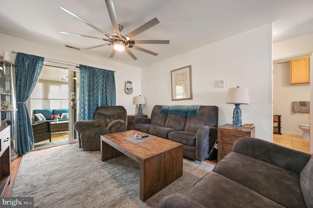 living room featuring ceiling fan