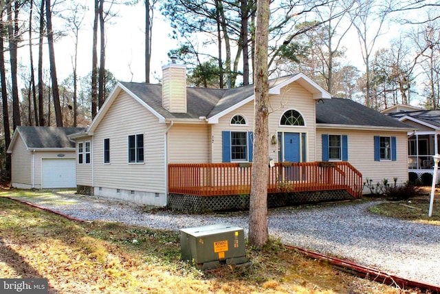 view of front of home featuring a garage and a deck