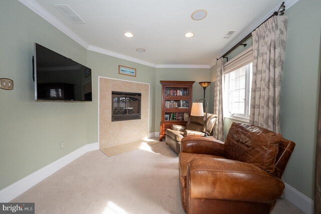 living area featuring crown molding, visible vents, baseboards, and a tiled fireplace