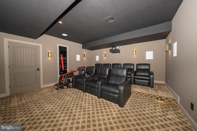 carpeted home theater featuring baseboards, visible vents, and recessed lighting