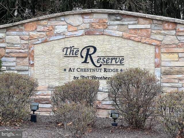 view of community sign