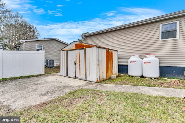 view of outbuilding with cooling unit