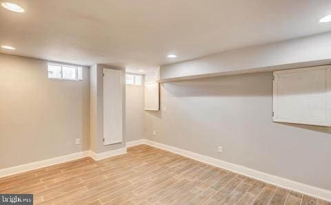 basement featuring light wood-type flooring